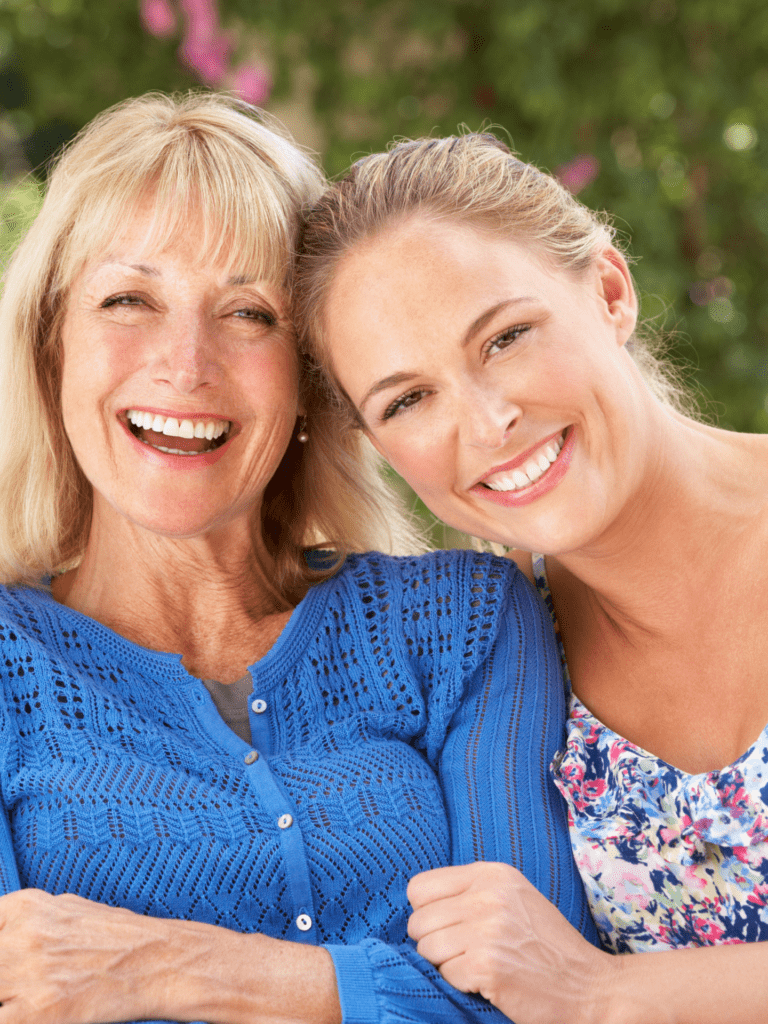 Two Blonde Women Wearing A Sweater And A Blouse Posing Together Smiling For Viveve Vaginal Rejuvenation Treatment Page