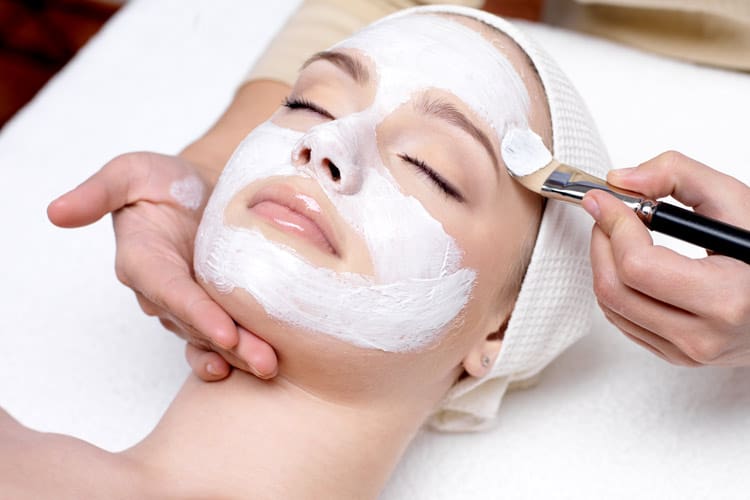 Woman Receiving Facial Treatment Skin Care Clay Mask With Brush